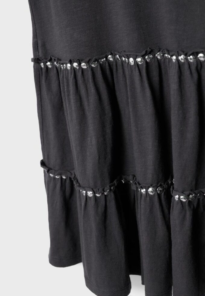 Abito con volant e borchie