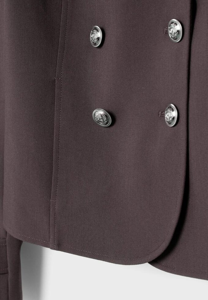 Blazer con bottoni incisi