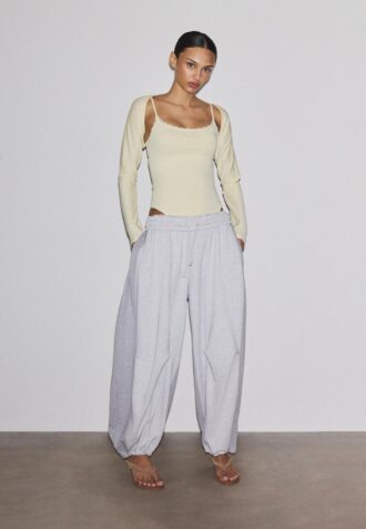 Body con dettagli in pizzo biondo