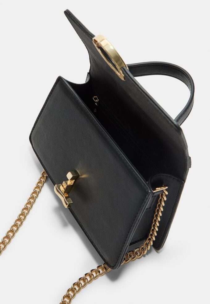 Borsa a tracolla con chiusura rotonda