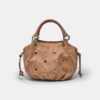 Borsa a tracolla rotonda con dettaglio a occhielli