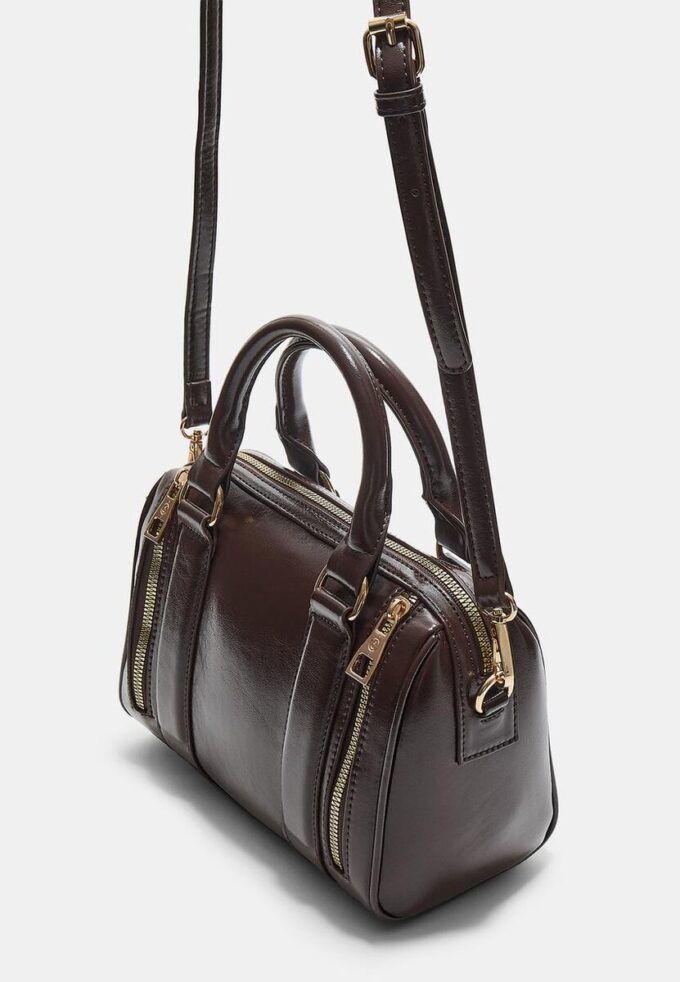 Borsa effetto pelle con cerniere