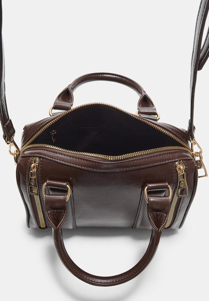 Borsa effetto pelle con cerniere
