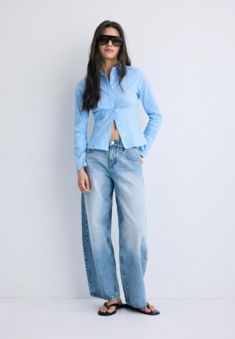 Camicia aderente con cucitura sotto il seno