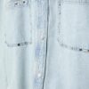 Camicia oversize in denim corta con borchie