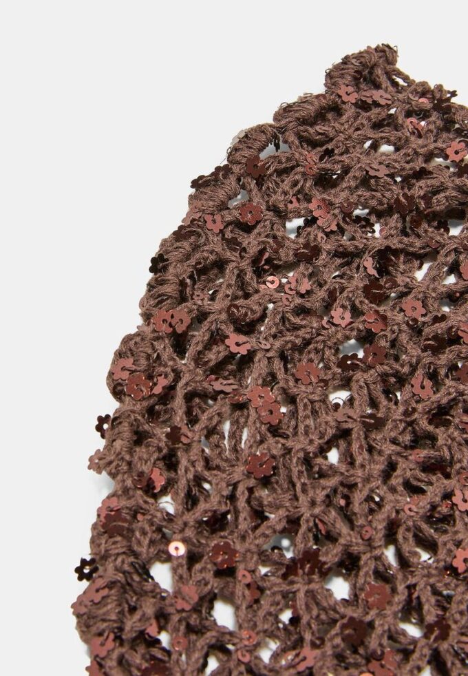 Cappellino con fiore in paillettes Cappellino con fiore in paillettes