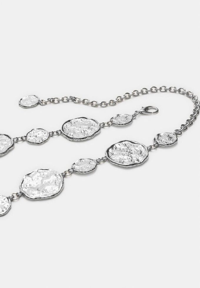 Cintura in metallo con placche rotonde