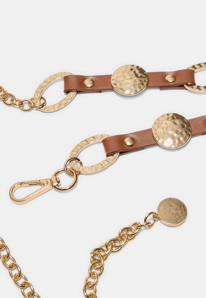 Cintura in metallo effetto pelle