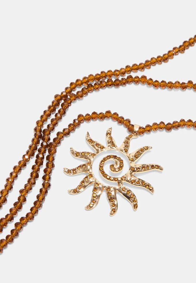 Collana con perline a forma di sole