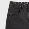 D62 Skort in denim con borchie