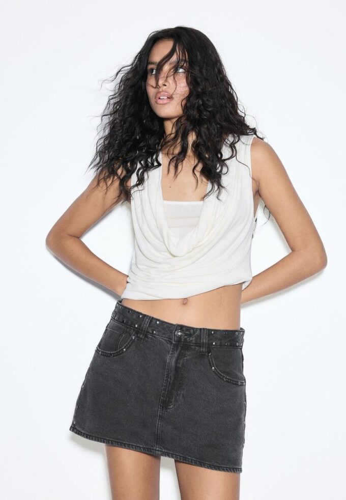 D62 Skort in denim con borchie