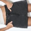 D62 Skort in denim con borchie