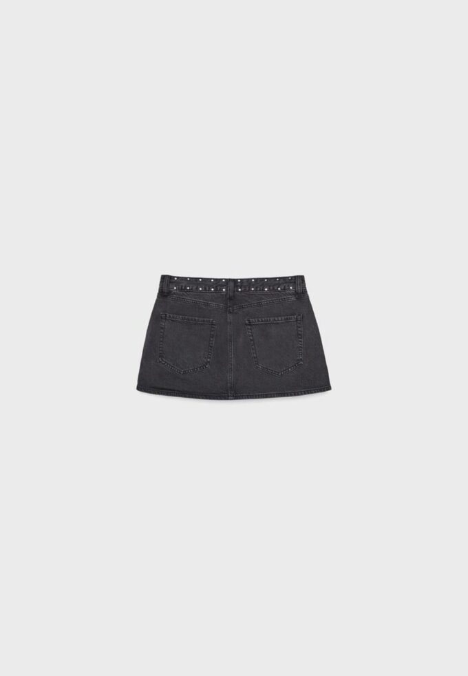 D62 Skort in denim con borchie