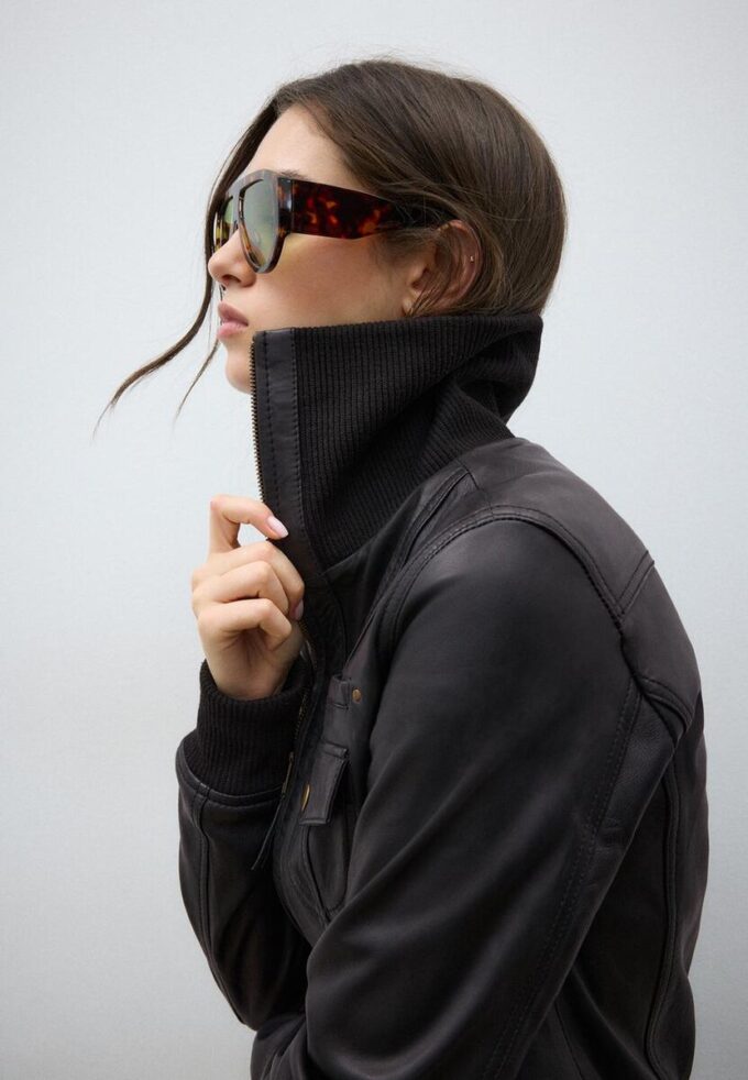 Giacca in pelle combinata a coste