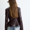 Giacca peplum effetto pelle senza colletto