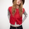 Gilet in maglia con spalline imbottite Gilet in maglia con spalline imbottite
