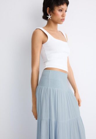 Gonna a pannelli con filo metallico