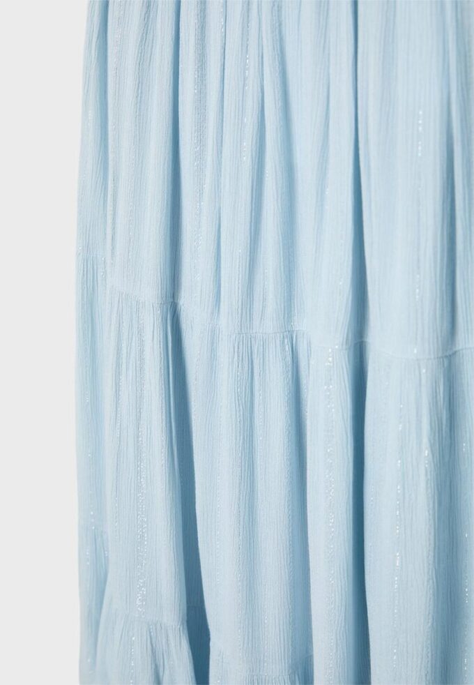 Gonna a pannelli con filo metallico