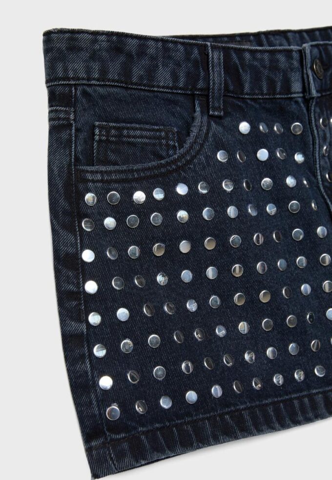 Gonna in denim con borchie