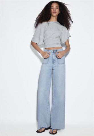 Jeans a gamba dritta con tasche