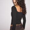 Maglietta a maniche lunghe con scollo all’americana