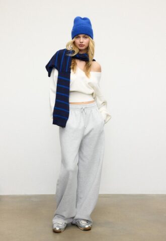 Maglione con scollo a V e maniche a pipistrello