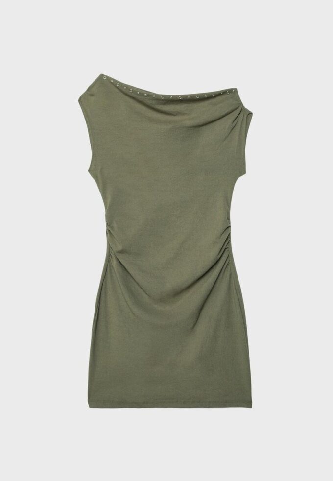 Miniabito asimmetrico con borchie