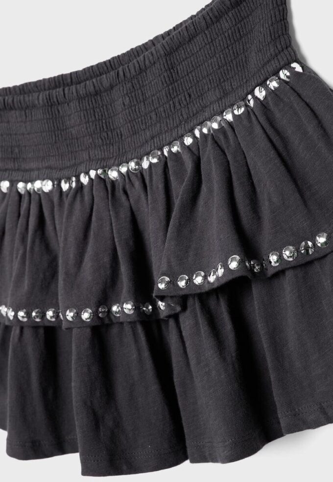 Minigonna con volant e borchie