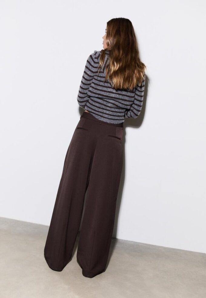 Pantaloni eleganti a zampa con pinces