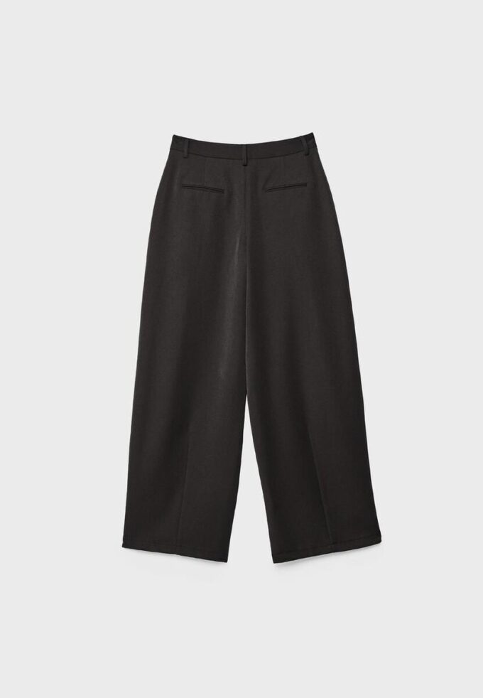 Pantaloni eleganti a zampa con pinces