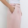 Pantaloni sarouel con pinces e fibbia