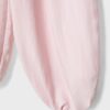Pantaloni sarouel con pinces e fibbia