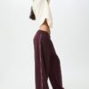 Pantaloni Wide Leg in tessuto felpato con bordino Pantaloni Wide Leg in tessuto felpato con bordino