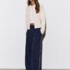Pantaloni Wide Leg in tessuto felpato con bordino Pantaloni Wide Leg in tessuto felpato con bordino
