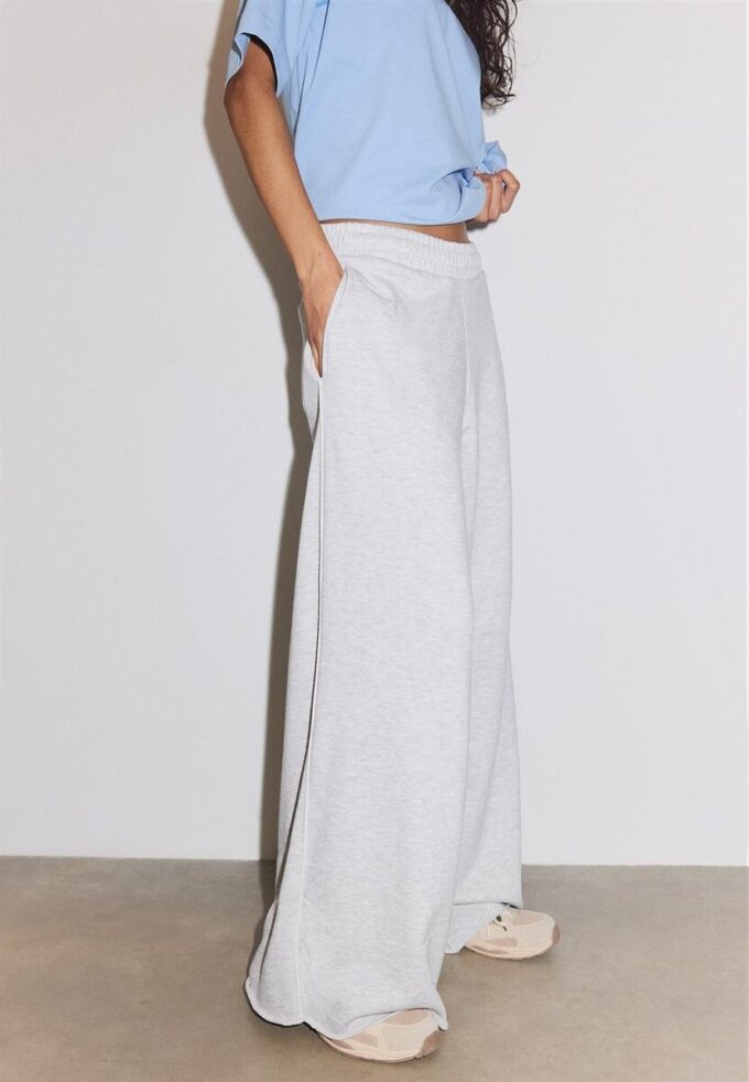 Pantaloni Wide Leg in tessuto felpato con bordino Pantaloni Wide Leg in tessuto felpato con bordino