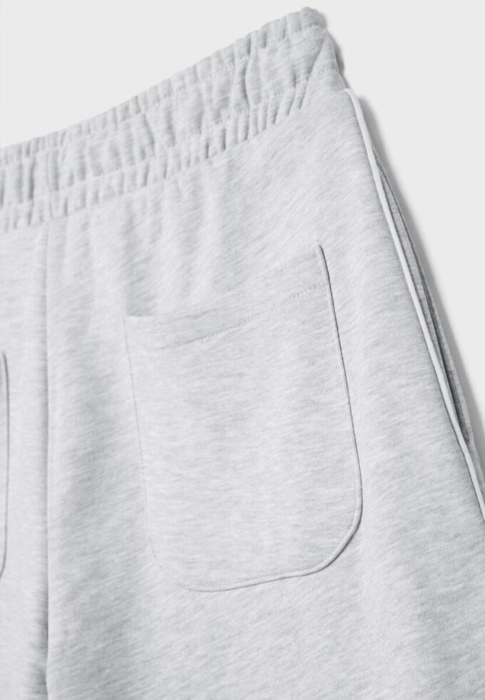 Pantaloni Wide Leg in tessuto felpato con bordino Pantaloni Wide Leg in tessuto felpato con bordino