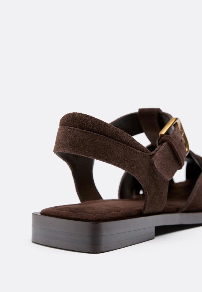 Sandali a gabbia in pelle con borchie