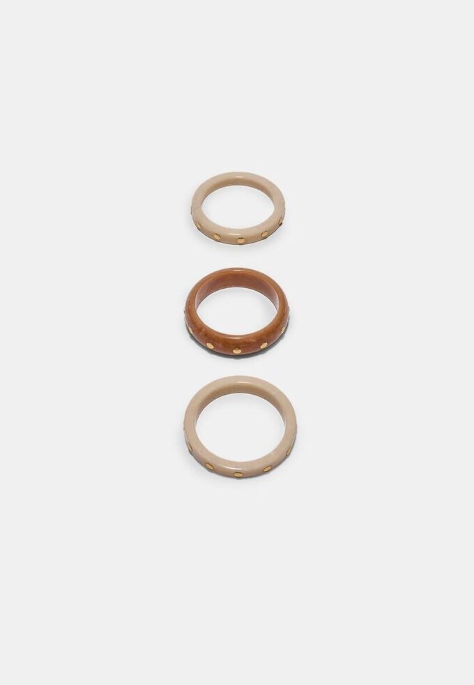 Set di 3 bracciali rigidi con borchie