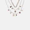 Set di 3 collane con ciondoli assortiti