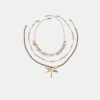 Set di 3 collane con libellula