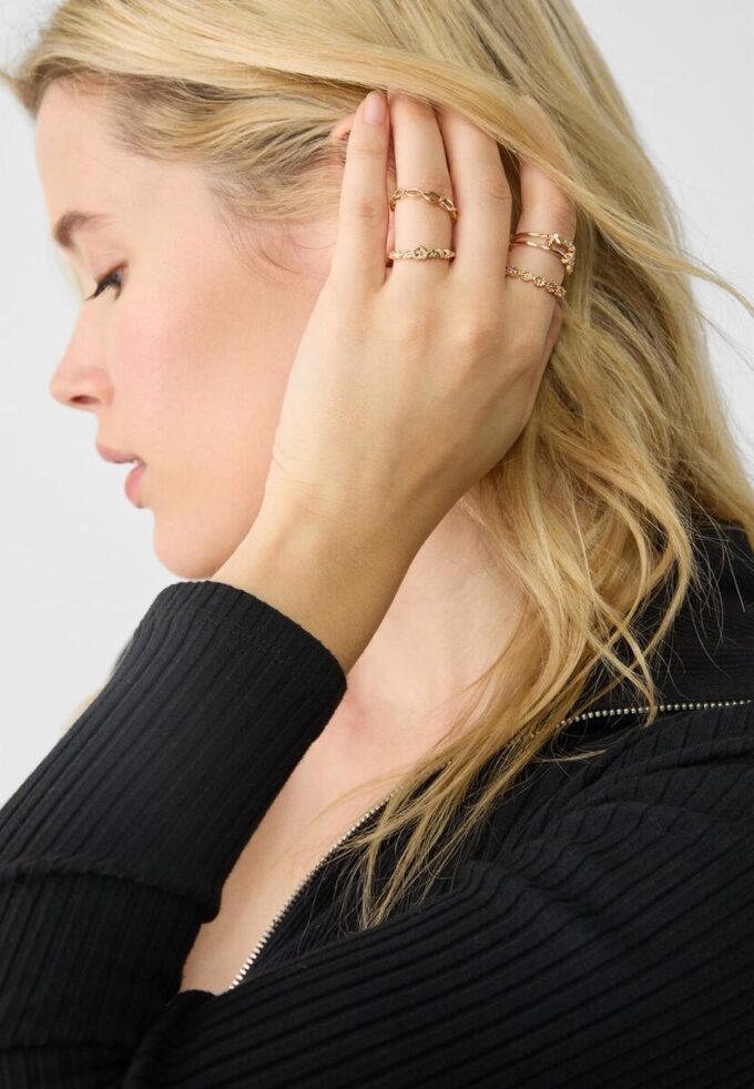 Set di 9 anelli a farfalla e strass