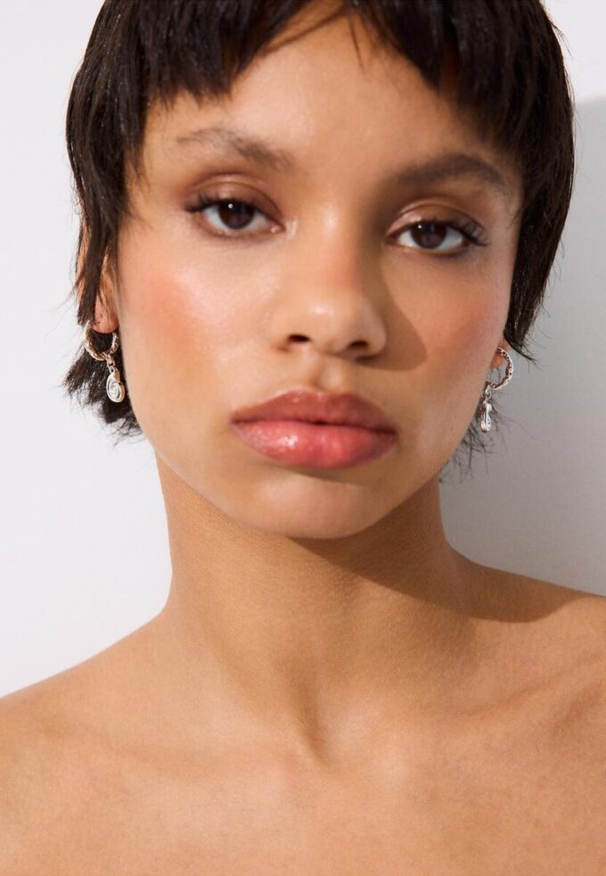 Set di 9 orecchini a stella marina con strass