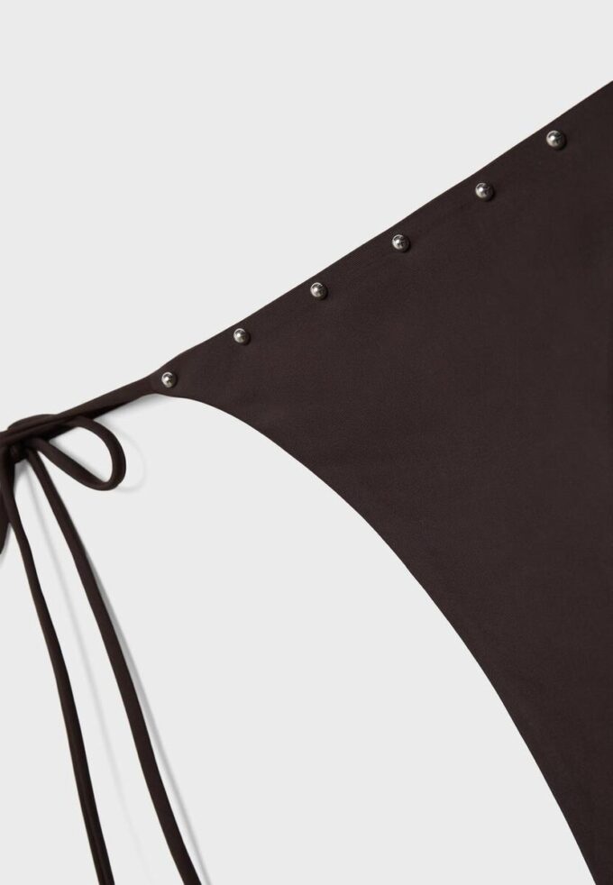 Slip bikini con lacci e borchie Slip bikini con lacci e borchie