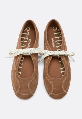 Sneakers in pelle con fiocco