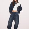 T-shirt a maniche corte con arricciature laterali