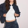 T-shirt a maniche corte con arricciature laterali