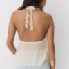 Top con scollo all’americana e bordi in pizzo Top con scollo all’americana e bordi in pizzo