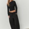Top con scollo asimmetrico