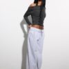 Top con scollo asimmetrico