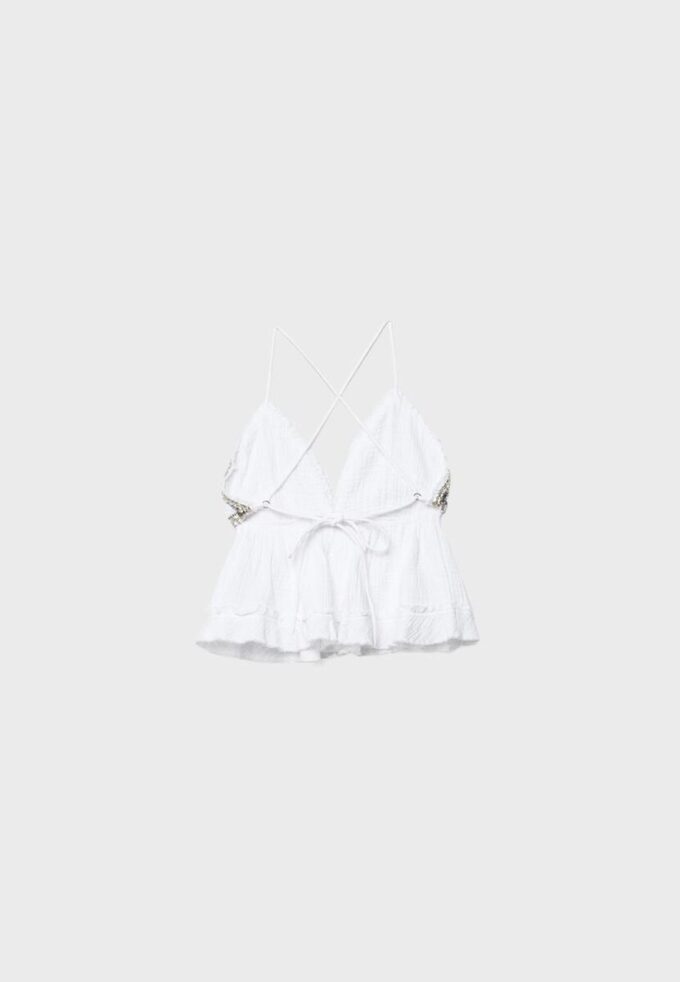 Top con volant e perline